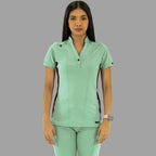 Vista frontal de la filipina y pantalón médico verde menta con detalles vino.